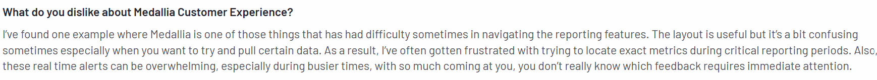 A screenshot of Medallia pricing review given on G2 review talking about reporting capabilities