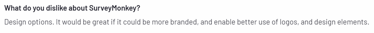 The image shows a customer review on the G2 platform regarding SurveyMonkey’s limited customization capabilities. 