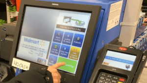 The image shows Walmart offering a self-service option for their customers to improve Retail Customer Experience