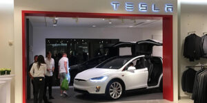 The image shows a Tesla gallery