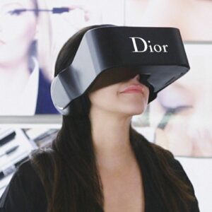The image shows the use of a VR headset in Dior as one of the retail customer experience examples