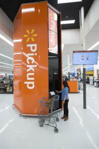 An image showing Walmart installing a kiosk to deliver an excellent customer experience 