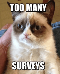 The image shows a meme on too many surveys where the character is grumpy about filling out too many surveys