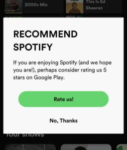 A screenshot of in-app rating survey of Spotify where users are asked to rate their experience with the app on the Google Play Store.