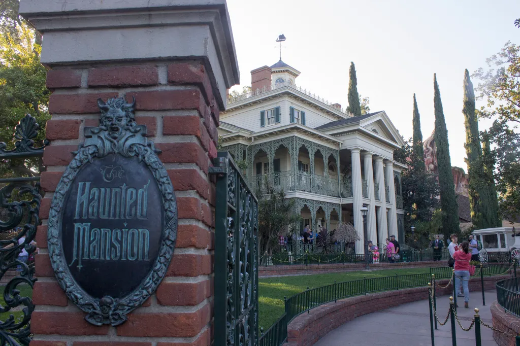 An image showing the Haunted Mansion in Disneyland Park where you can enjoy the spooky ride tour of the entire mansion 