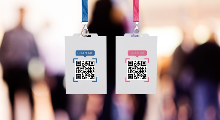 The image shows a QR code survey printed on a name tag with which attendees can scan the code and provide feedback on their experience. 