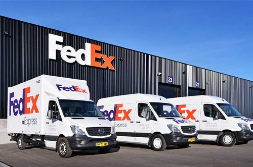 An image showing FedEx’s delivery fleet, which is among the best customer service companies