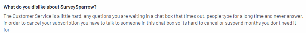 The image shows a con of SurveySparrow regarding the tool’s delayed customer support. 