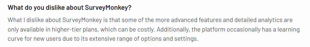 An image with a user review for SurveyMonkey on G2, highlighting feedback on its limited features in lower-tier plans and its steep learning curve.

