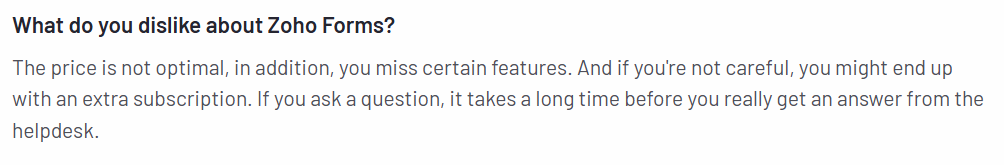 An image showing a user review of Zoho Forms on G2, mentioning pricing concerns, missing features, and slow customer support.