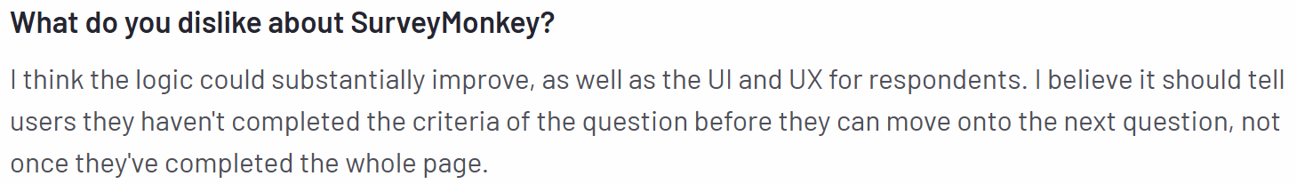 The image shows a customer review on the G2 platform regarding SurveyMonkey’s non-intuitive interface.