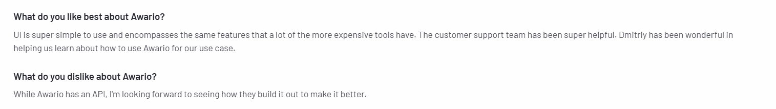 The image shows a con of Awario shared by a user on G2.